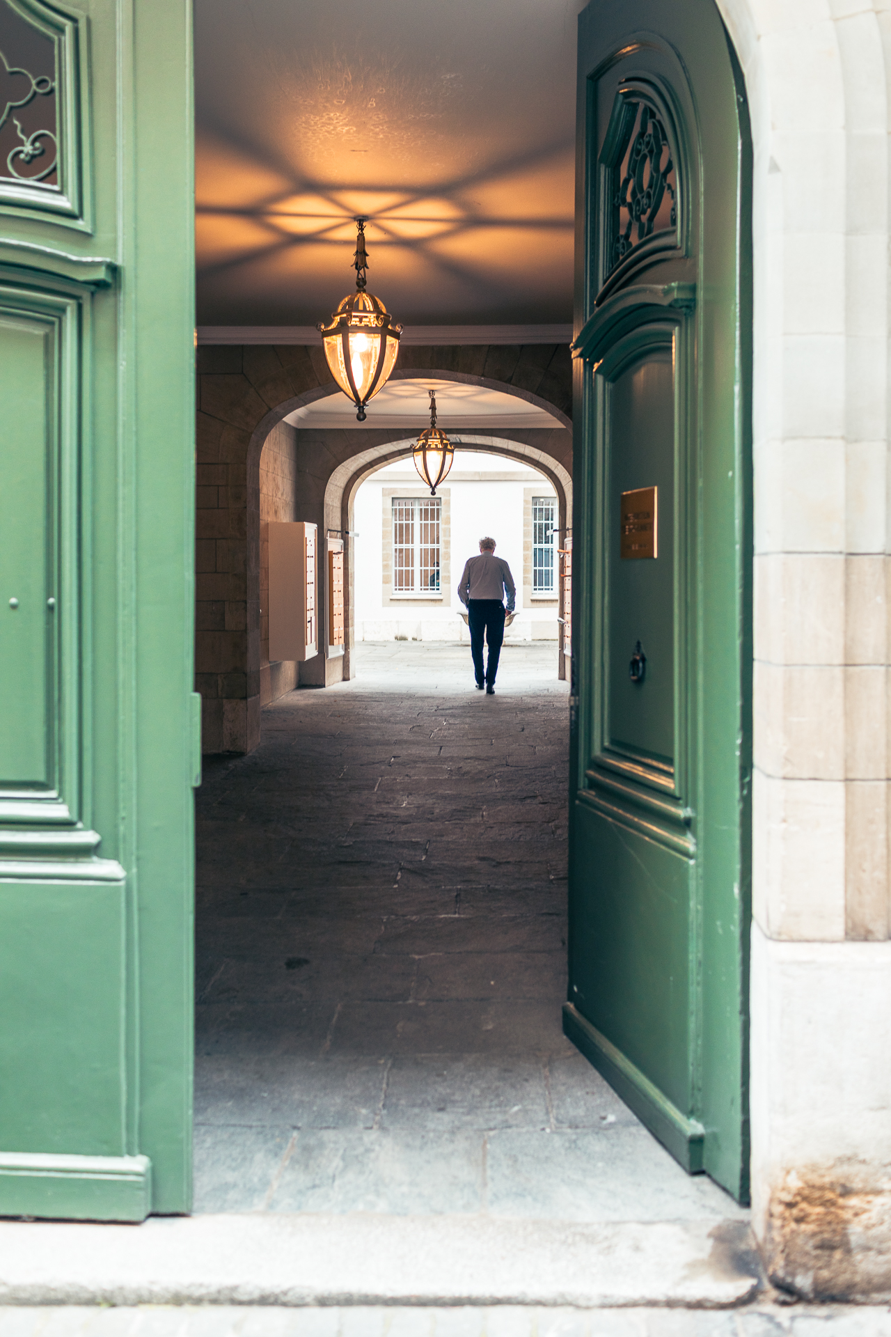 Covered passage with green door at Grand-Rue